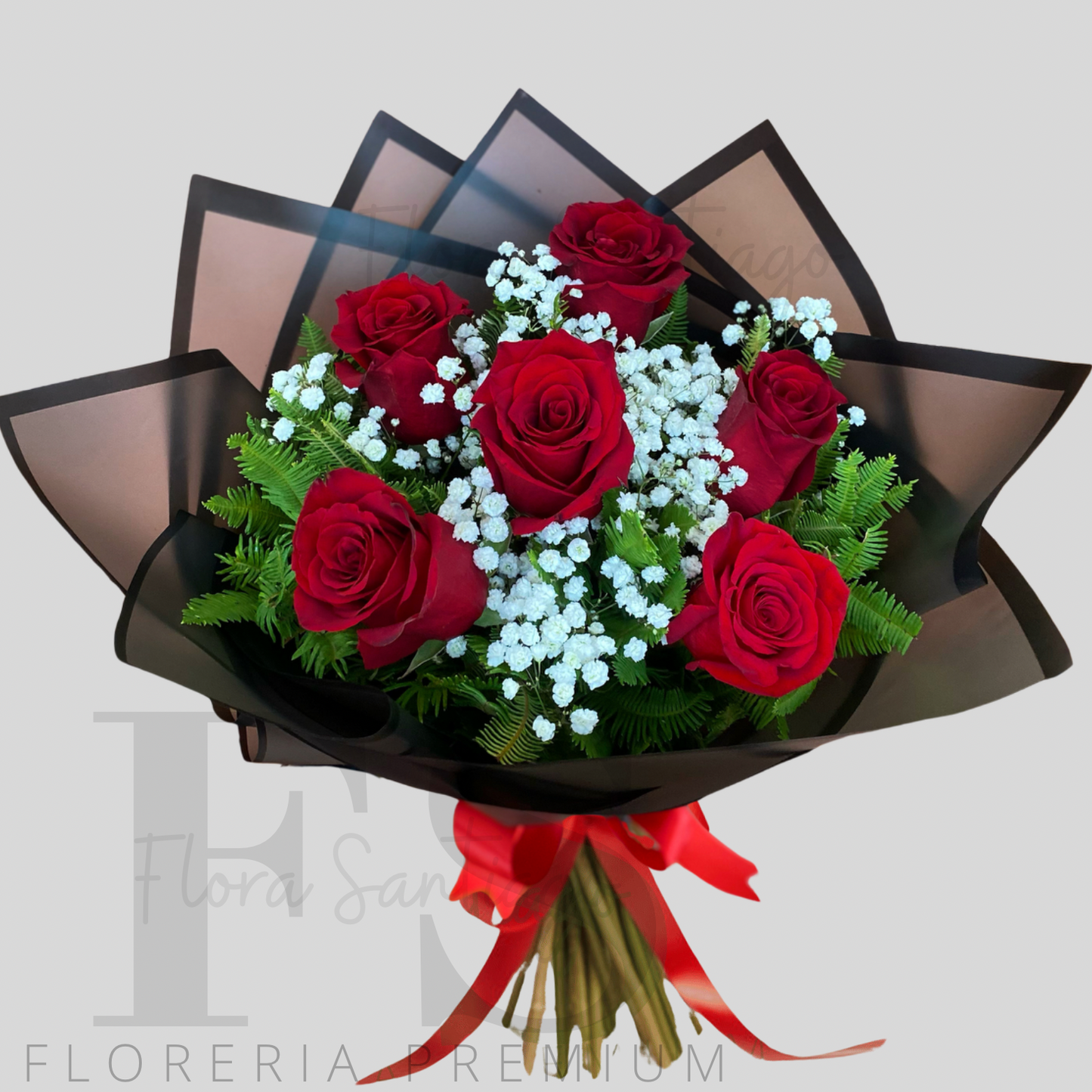 Ramo de 6 rosas rojas envuelto en papel coriano, envía flores a domicilio