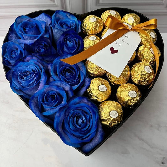 Caja corazón 9 rosas azules y 12 bombones