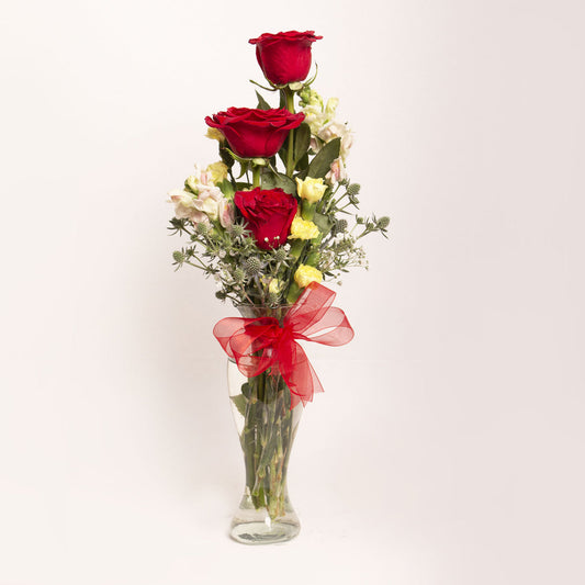 3 rosas en florero
