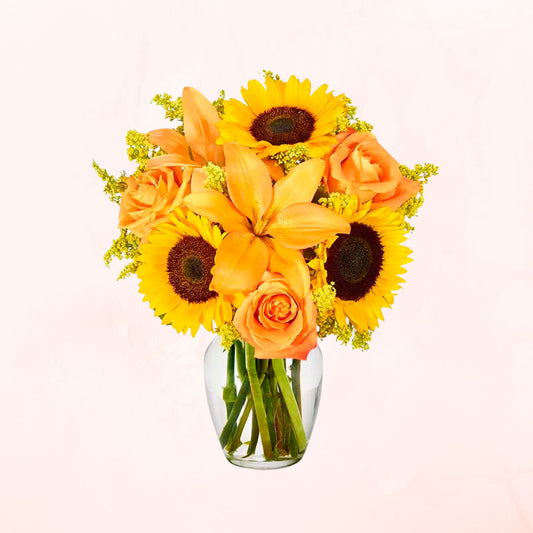 Florero de Rosas Naranja y Girasoles